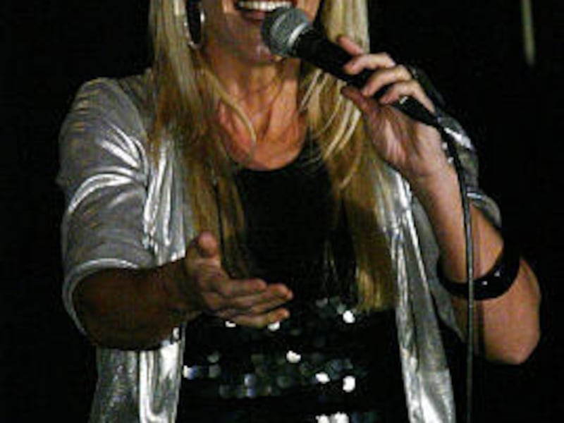 Jenny Jordan Frogley performs a song at the Pearl Awards.