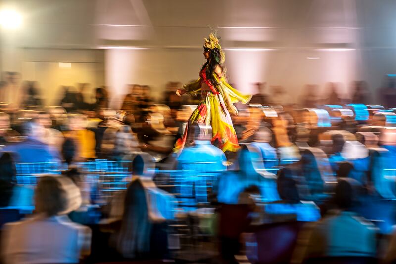 A model walks the runway in a design by Marissa Tampoya during Pittsburgh Fashion Week’s designer runway show, Wednesday, Sept. 21, 2022, at Wintergarden at PPG Place in Pittsburgh.