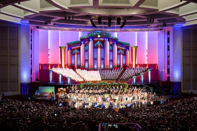 Members of The Tabernacle Choir at Temple Square from past and present gather on stage to sing together as part of the post-show celebration of the 5,000th episode of “Music & the Spoken Word” at the Conference Center in Salt Lake City on July 13, 2025.