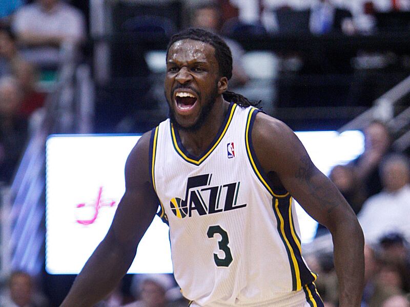 DeMarre Carroll celebrates a good defensive play as the Utah Jazz and the Memphis Grizzlies play Saturday, Dec., 15, 2012, at Energy Solutions arena.