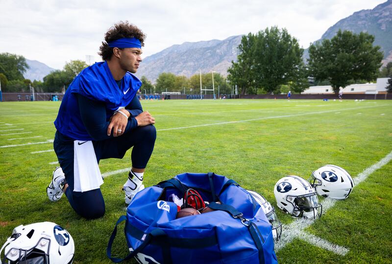 BYU quarterback Jaren Hall looks on during during first day of practice in Provo on Thursday, Aug. 4, 2022.