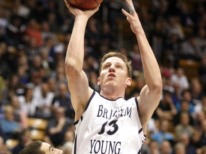 BYU's Brock Zylstra shoots over Portland's Bryce Pressley during the Cougars' 86-72 victory over the Pilots Saturday.