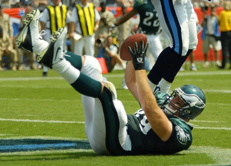 Philadelphia Eagles tight end Chad Lewis (89) celebrates his touchdown catch in the second quarter on Sunday, Sept. 8, 2002 in Nashville, Tenn. (AP Photo/John Russell)
