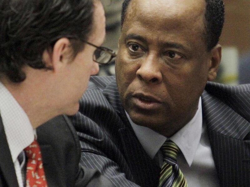 Dr. Conrad Murray, Michael Jackson"™s personal physician, right, confers with his attorney Edward M. Chernoff, in Los Angeles Superior Court, Tuesday, Jan. 25, 2011. Murray pleaded not guilty to a charge of involuntary manslaughter in the pop star"™s dea