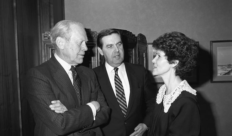 Jeffrey R. Holland and his wife, Patricia, visit with President Gerald R. Ford, the 38th president of the United States, during his visit to Brigham Young University, March 19, 1987.