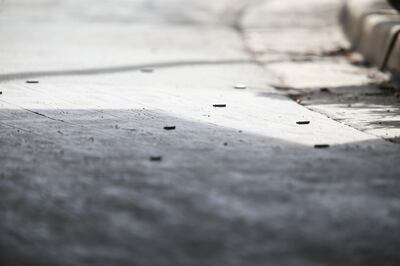 Shell casings from a shooting at the Sheraton Hotel in Salt Lake City are pictured on Monday, April 8, 2019. A man who apparently opened fire outside the hotel on died after leading police on a chase into South Salt Lake that ended in a crash and a hail o
