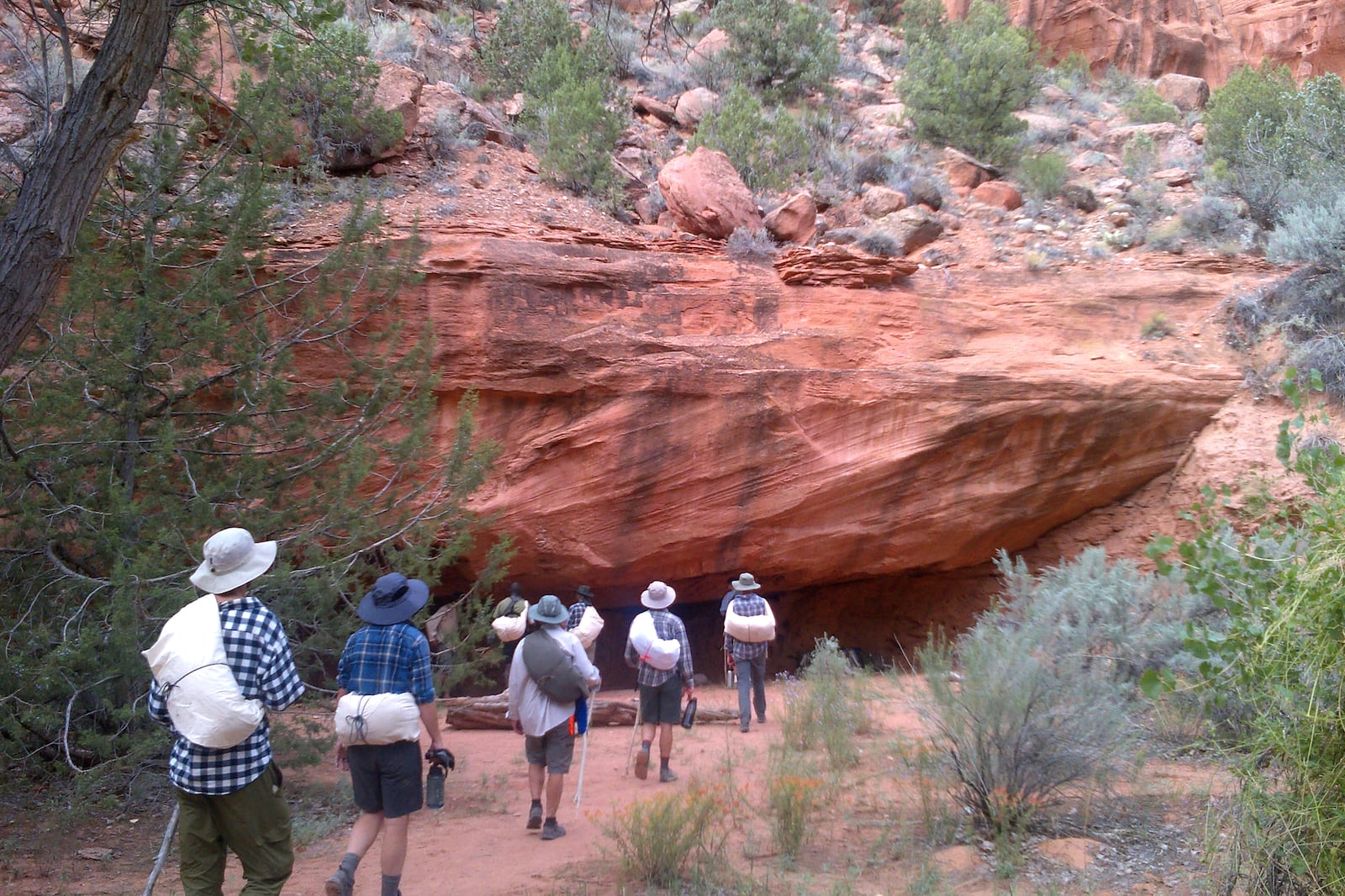 The author’s fellow students arrive at an overhang on Day 3 of their expedition, near a rugged backcountry canyon known as “The Gulch.” 