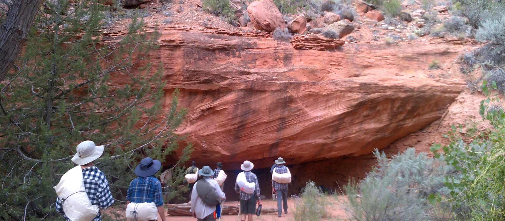 The author’s fellow students arrive at an overhang on Day 3 of their expedition, near a rugged backcountry canyon known as “The Gulch.” 