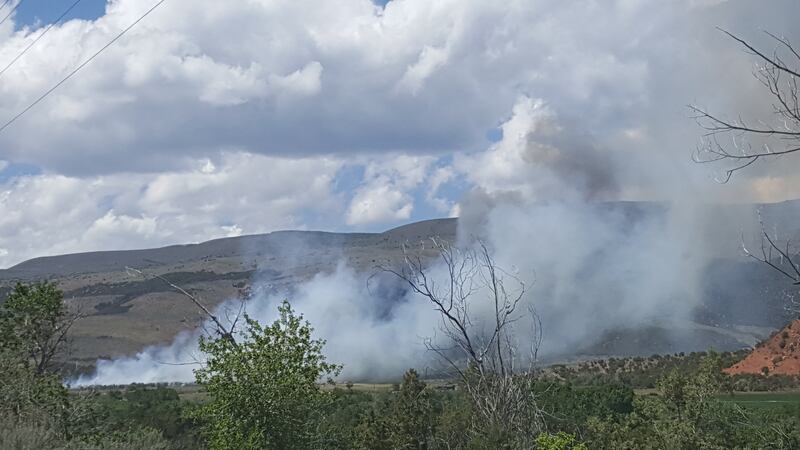 Smoke rises from a fire in the Red Cloud Loop area near Vernal on Friday, June 1, 2018. Evacuations were ordered for homes along Dry Fork Settlement Road and Red Cloud Loop.