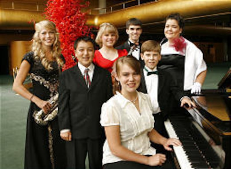 Joining Bethany Richards at the piano are, from left to right, Ryan Tani and Zachary Adamson in the second row and Mandy Hillary, Rebekah Lara Willey, John Sargeant and Melissa Jensen in the back row. They will perform during the Salute to Youth concert a