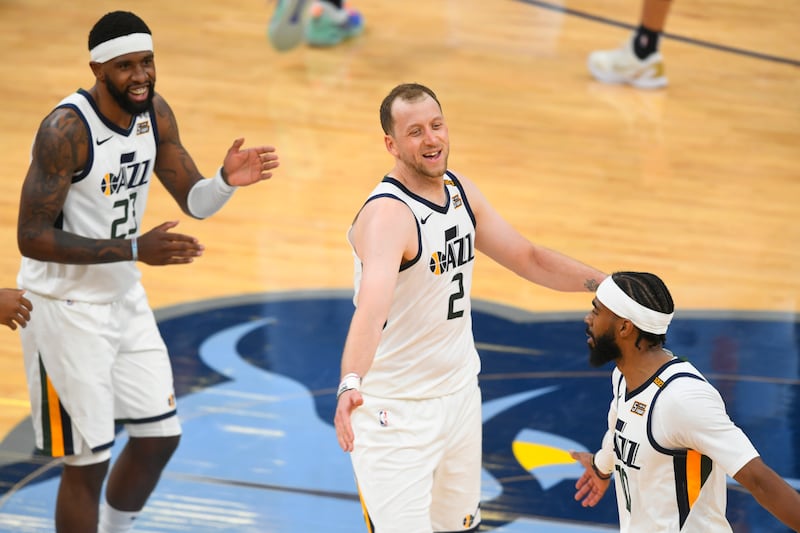 Utah Jazz guard Joe Ingles and forward Royce O’Neale celebrate a basket during Game 3 of their playoff series against the Memphis Grizzlies.