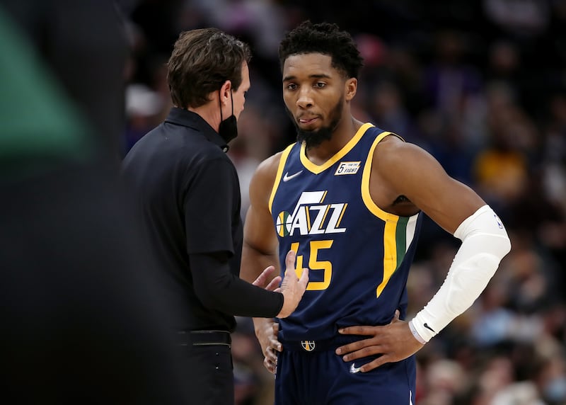 Jazz head coach Quin Snyder talks with Utah Jazz guard Donovan Mitchell.