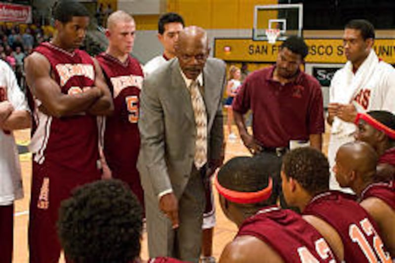 Samuel L. Jackson, center, plays a basketball coach who insists on strict academic goals for his players in the drama "Coach Carter."