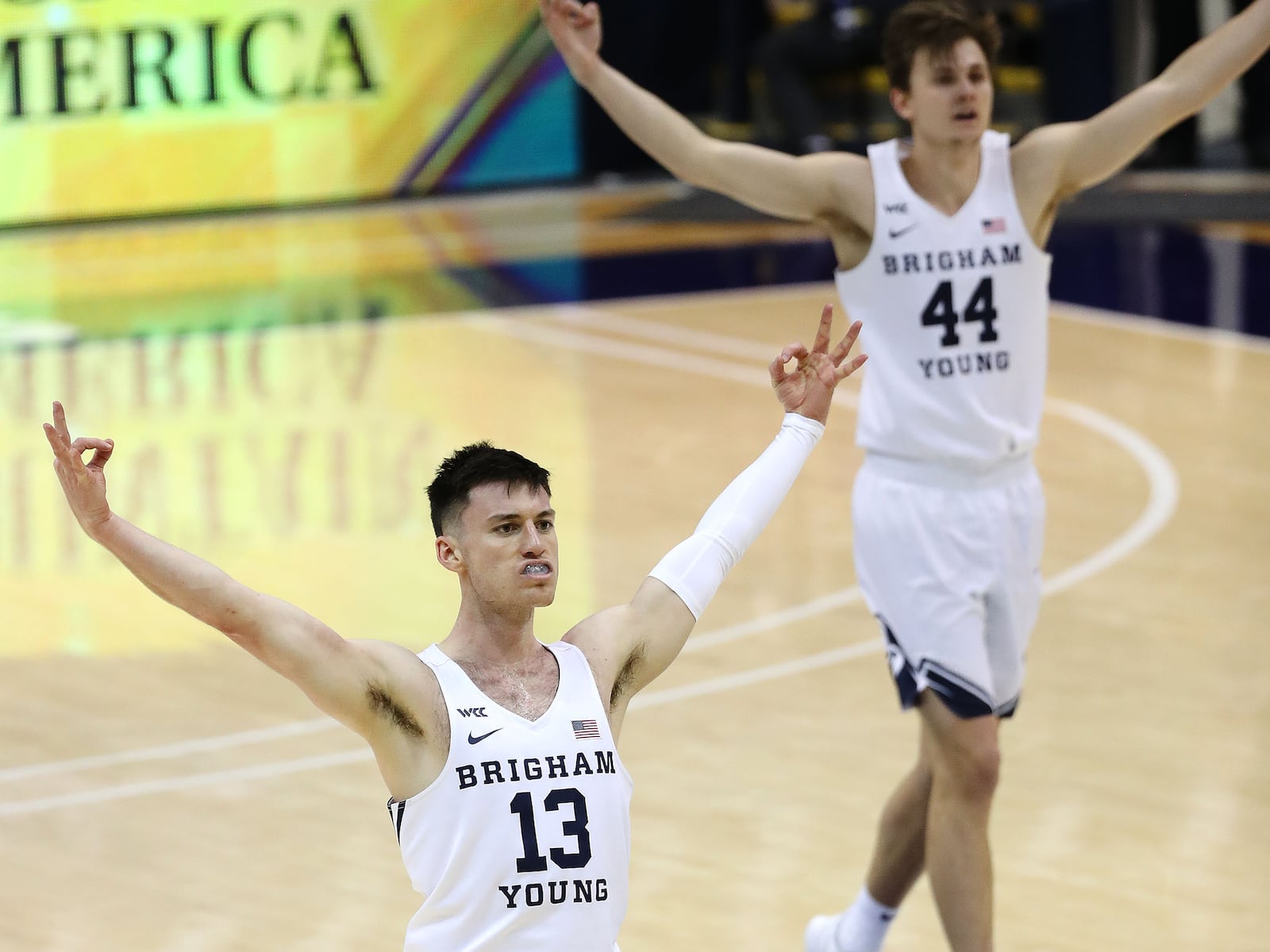 BYU guard Alex Barcello (13) reacts after hitting 3-pointer against the San Francisco Dons in Provo on Feb. 25, 2021.