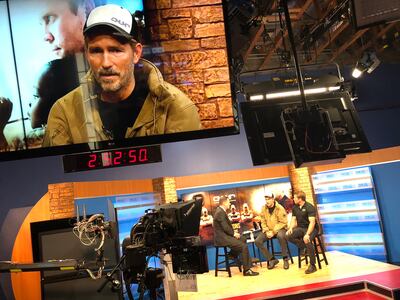 Actor Jim Caviezel and Tim Ballard, founder and CEO of Operation Underground Railroad, sit together for a television interview. Caviezel recently spent a few days shadowing Ballard before he portrays him in the 2019 film, "The Sound of Freedom."