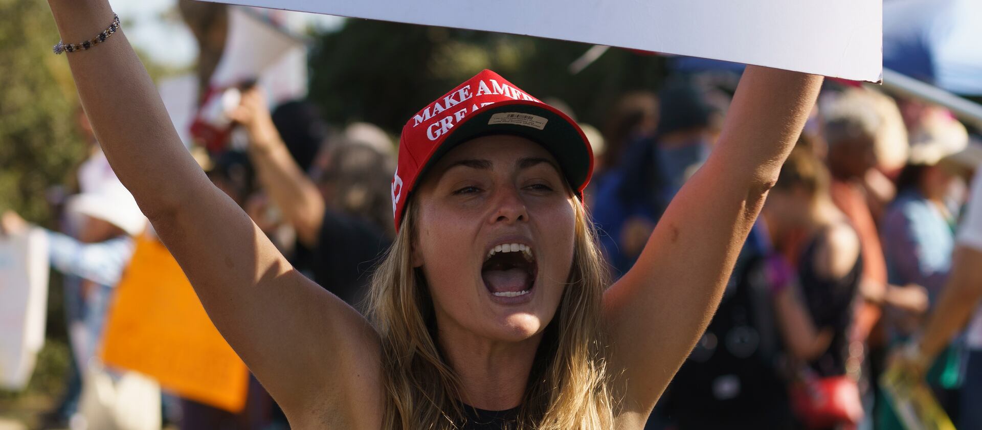 Demonstrators rally against a vaccine mandate for passports.
