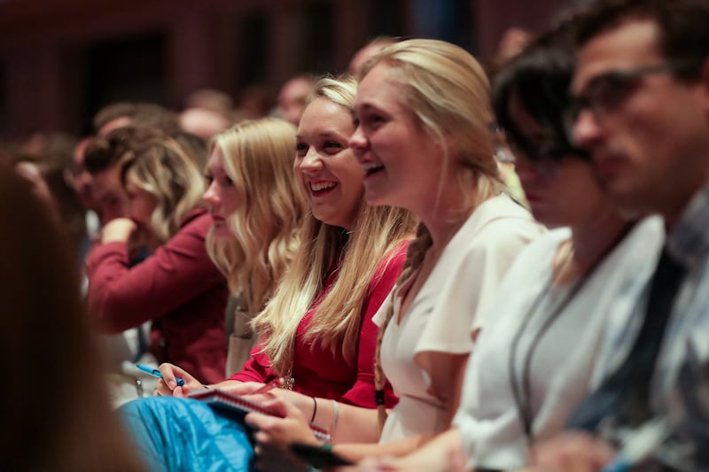 Conference-goers listen as Elder Quentin L. Cook, of the Quorum of the Twelve Apostles, details adjusted Sunday church schedules during the Saturday morning session of the 188th Semiannual General Conference of The Church of Jesus Christ of Latter-day Sai