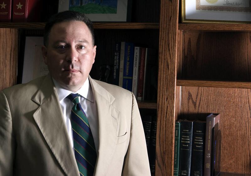 Utah County Attorney Jeff Buhman poses for a portrait in his office in Provo in October 2008. Buhman announced Thursday he will not seek re-election.