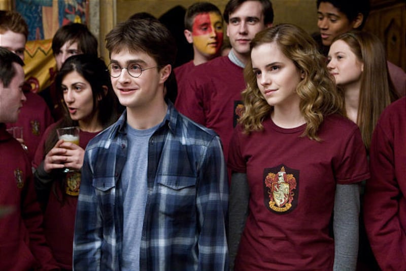 Daniel Radcliffe as Harry Potter, left, and Emma Watson as Hermione Granger.
