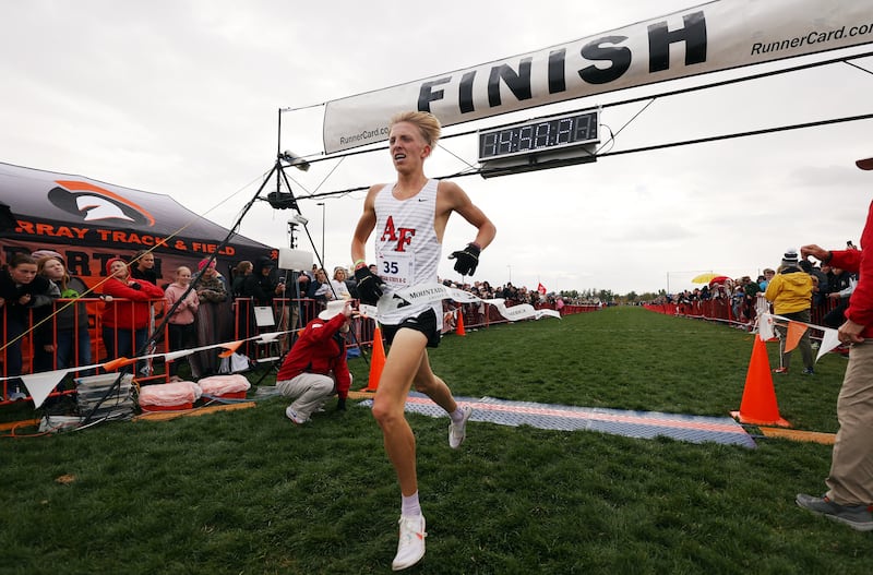 American Fork’s Daniel Simmons, crosses the finish line in first place with a time of 14:49.8, as 6A runners compete in the state high school cross-country championships at the Regional Athletic Complex in Salt Lake City on Tuesday, Oct. 25, 2022. 