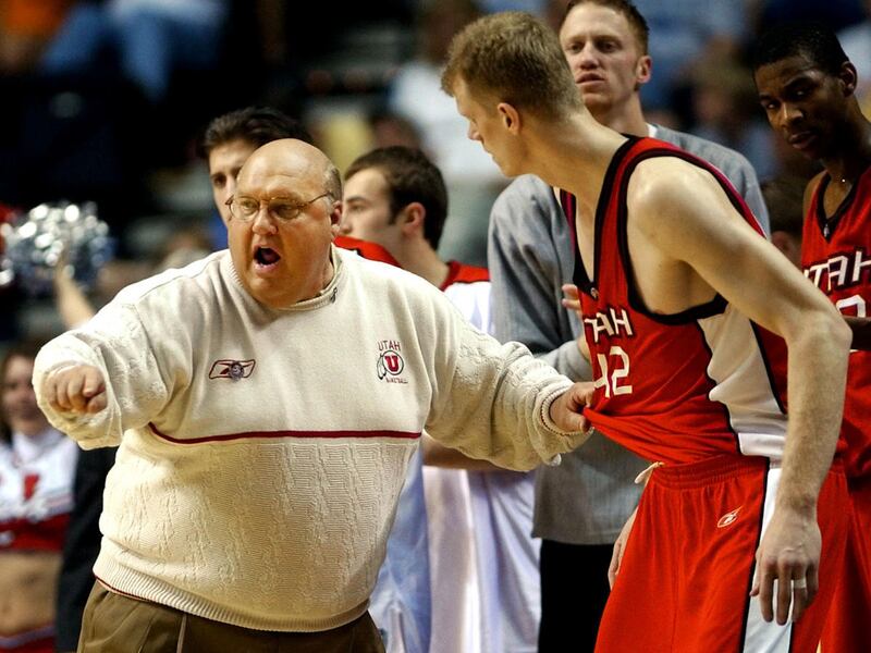 FILE - In this March 23, 2003, file photo, Utah head coach Rick Majerus instructs center Cameron Koford (42) before sending him into the game against Kentucky in the first half at the NCAA Midwest Regional basketball tournament in Nashville, Tenn.