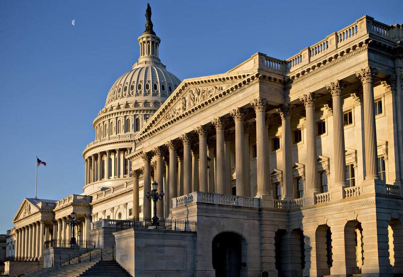 The U.S. Capitol is seen at sunrise in Washington, Monday, March 4, 2013.