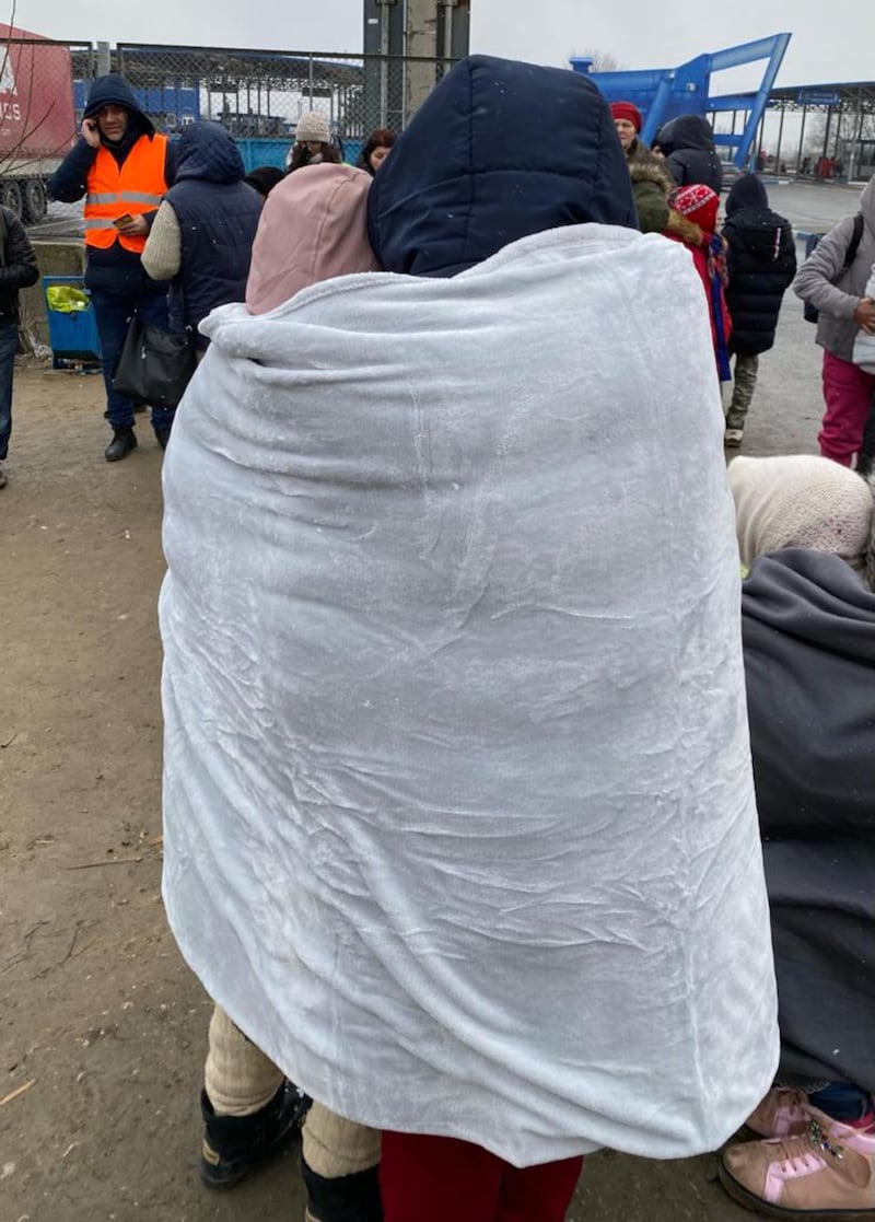 Members of The Church of Jesus Christ of Latter-day Saints in Moldova supply refugees with blankets at the Ukrainian border.