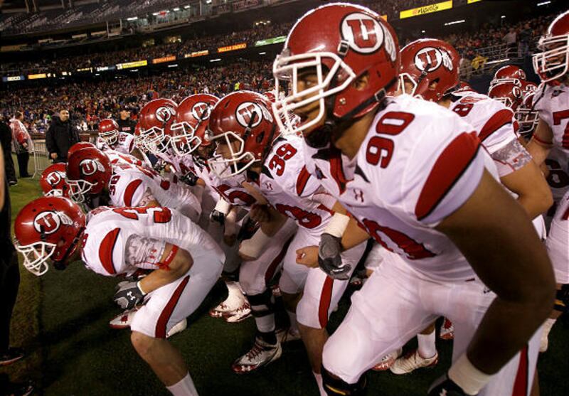 Derrick Shelby (90) and the rest of the Utah Utes get ready to take the field for a big Mountain West Conference football game against the San Diego State Aztecs at Qualcomm Stadium.