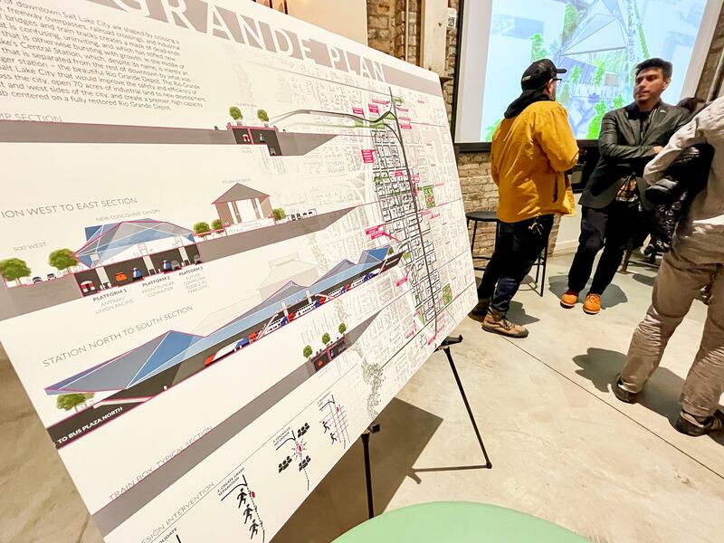 Salt Lake City Councilman Alejandro Puy, right, talks with a person following a Rio Grande Plan meeting at Woodbine Food Hall in Salt Lake City Thursday evening.  