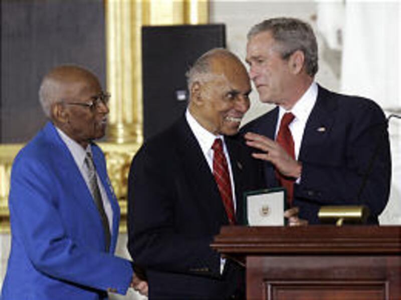 President Bush greets Alexander Jefferson, left, and Roscoe Brown of the Tuskegee Airmen Thursday. The veterans received the Congressional Medial of Honor.