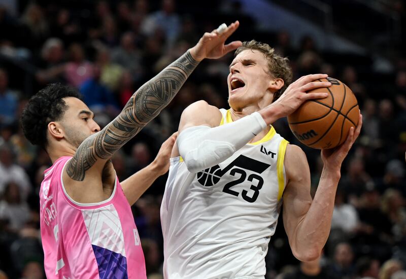 Utah Jazz forward Lauri Markkanen is guarded by Breakers’ Izayah Le’ Afa as the Utah Jazz and the New Zealand Breakers.