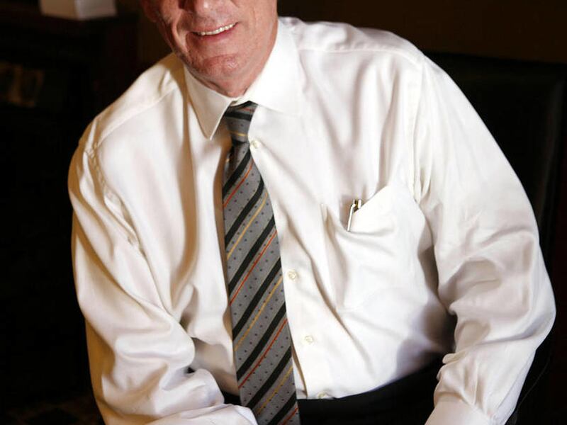 Peter Cooke poses for a photo in his office in Salt Lake City on Friday, June 29, 2012.