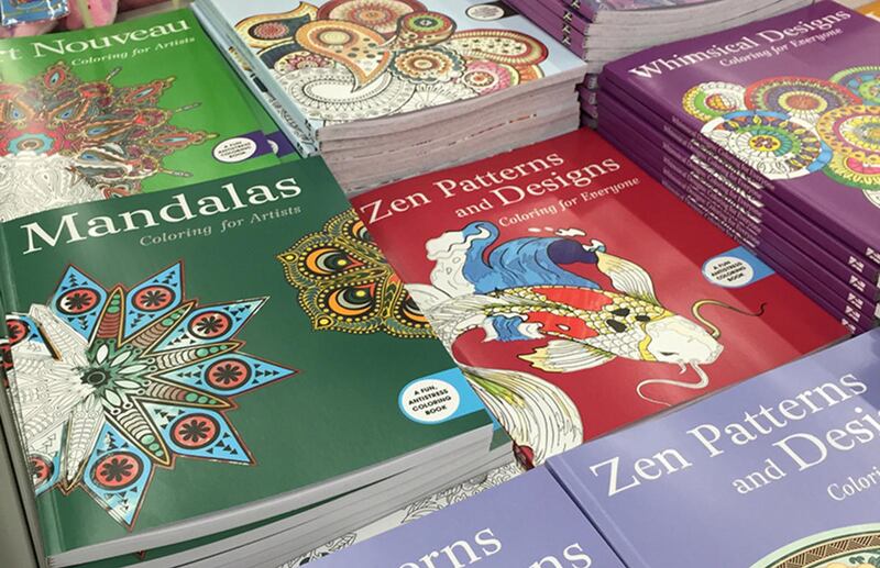A stack of adult coloring books inside an A.C. Moore craft store. Religion News Service photo by Leslie Miller