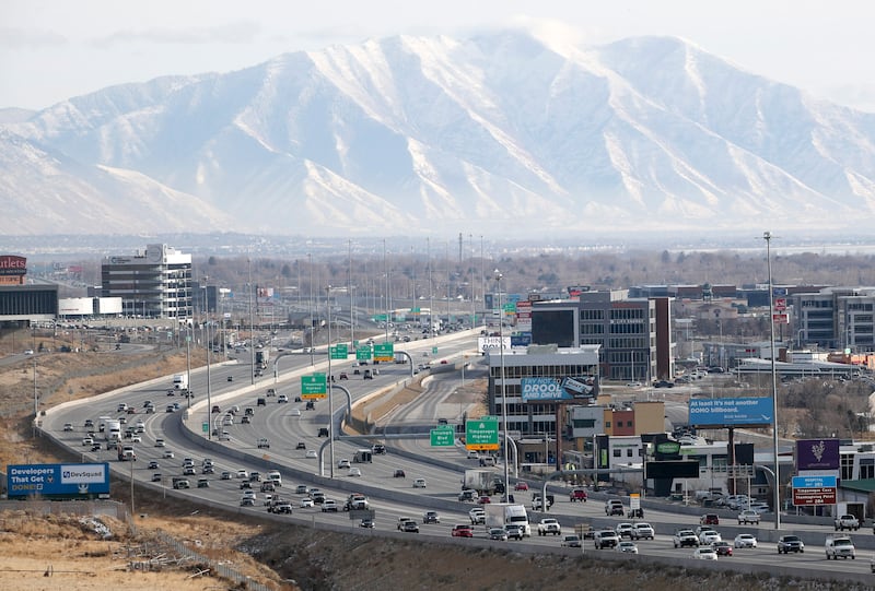 Traffic moves along I-15 in Lehi on Dec. 16, 2020. 