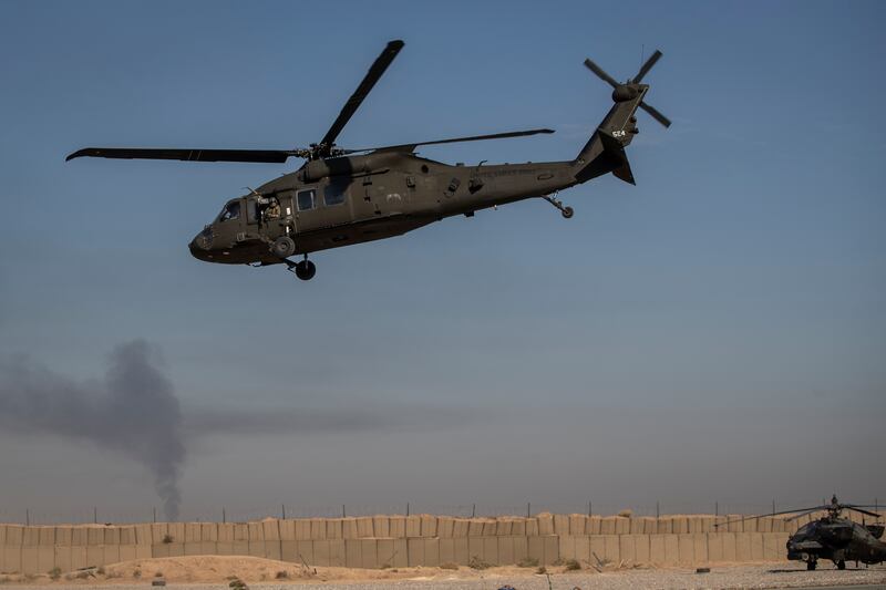 A helicopter takes off from a US military base at an undisclosed location in eastern Syria, on Nov. 11, 2019.