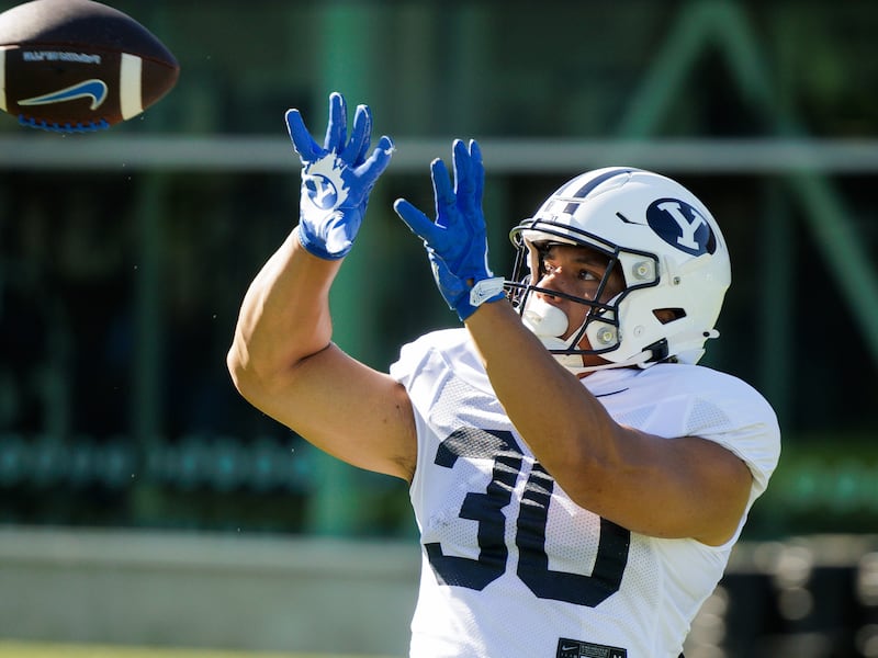 BYU running back Sione Moa catches a pass during fall camp in Provo. Moa is RB2 behind LJ Martin, but who is the next man up should Moa get injured?
