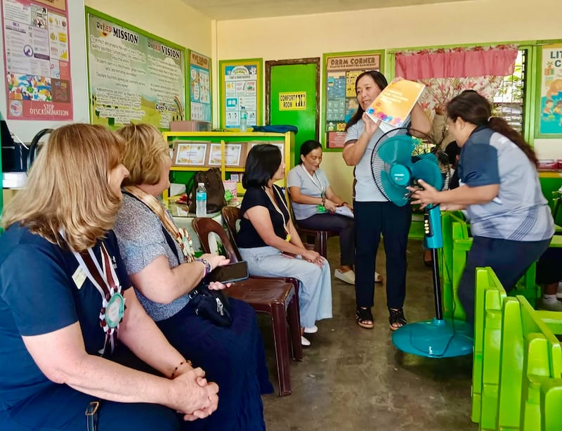 Volunteers serving under the Geneva Office for Human Rights Education train teachers in the Philippines.