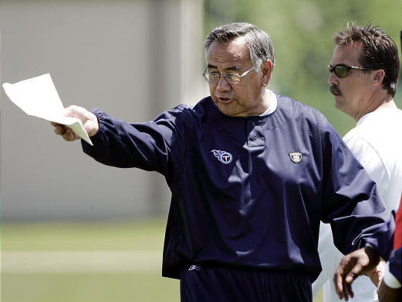 Former BYU, USC and Titans offensive coordinator Norm Chow was hired by UCLA on Monday.