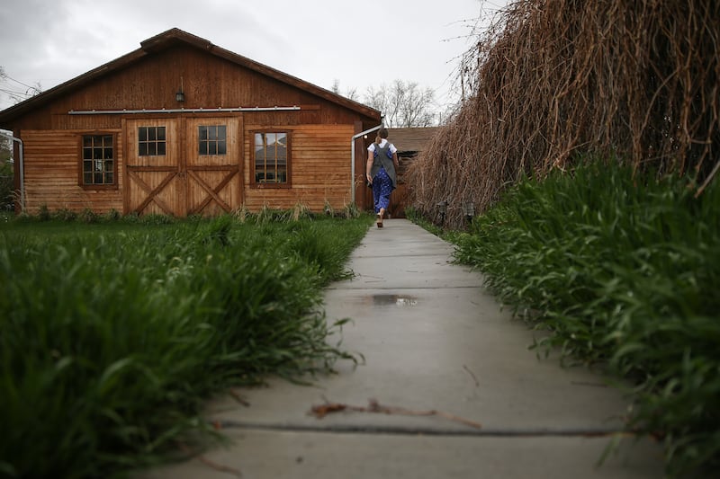 Caitlin Connolly walks to her home art studio in Provo on Thursday, April 12, 2018.