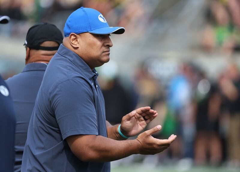 BYU coach Kalani Sitake applauds against Oregon at Autzen Stadium in Eugene on Saturday, Sept. 17, 2022.
