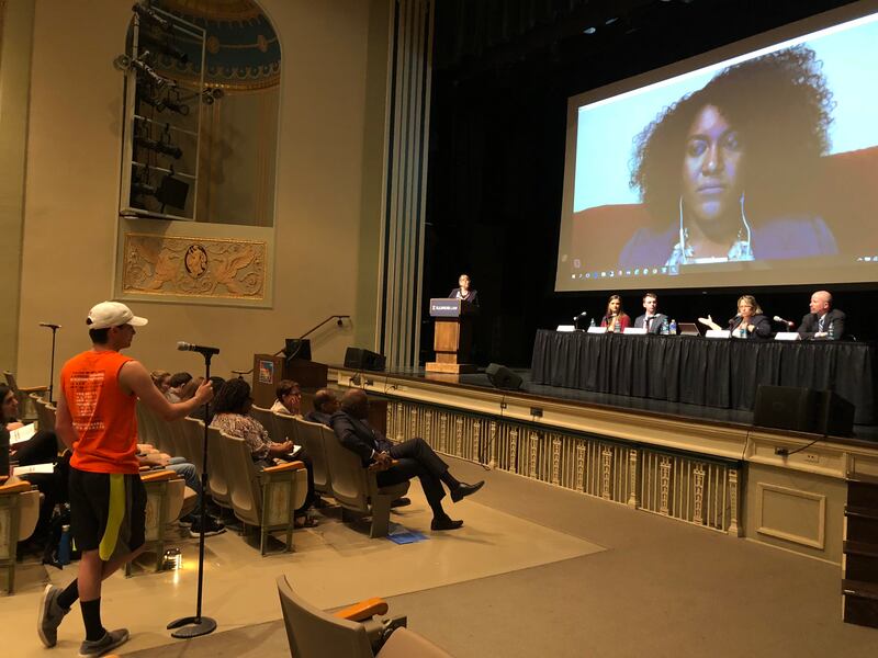 Bryce Tune, a college freshman, asks panelists about how to engage with politics when you don't fit neatly into one party during a Sept. 17 event in which participants discussed finding common ground as a more tolerant form of politics.