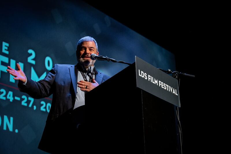 New co-owner and co-director Marshall Moore speaks at a past LDS Film Festival.