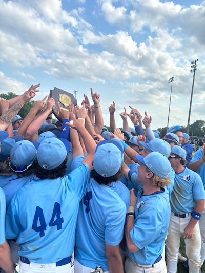 Members of the Salt Lake Community College baseball team celebrate their NJCAA West District Championship - Beatrice, Nebraska.