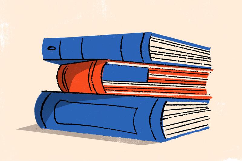 A stack of books in red, white and blue.