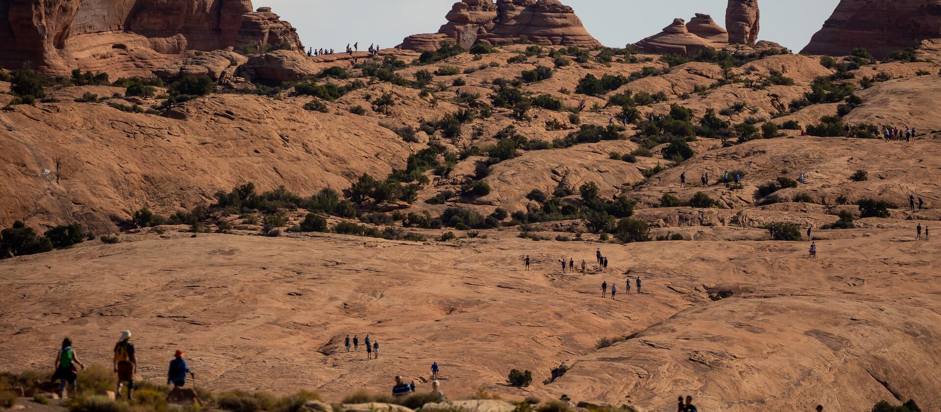 Visitors to Arches National Park make the hike to and from Delicate Arch on Sunday, Sept. 19, 2021.