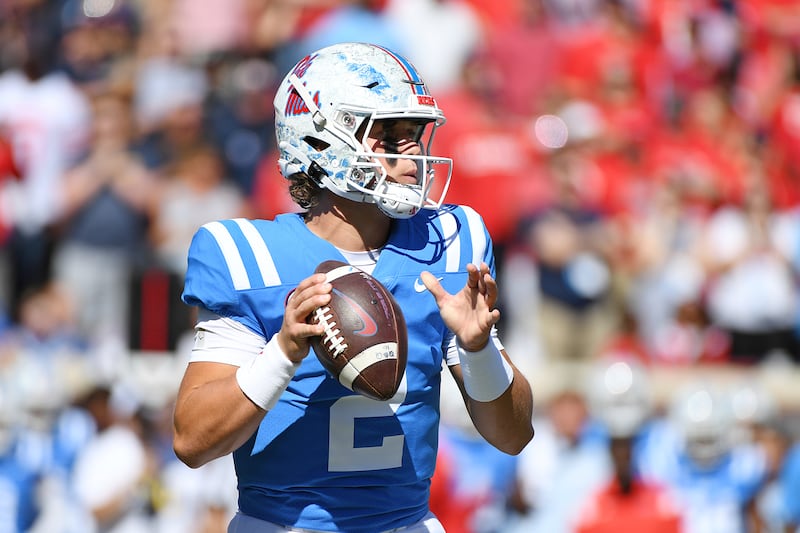 Mississippi quarterback Jaxson Dart (2) looks to pass during the first half of an NCAA college football game against Kentucky in Oxford, Miss., Saturday, Oct. 1, 2022. (AP Photo/Thomas Graning)