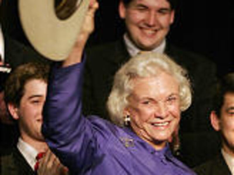 In March, Supreme Court Justice Sandra Day O'Connor waves a cowboy hat that was a gift at an event sponsored by the University of Houston Law Center.