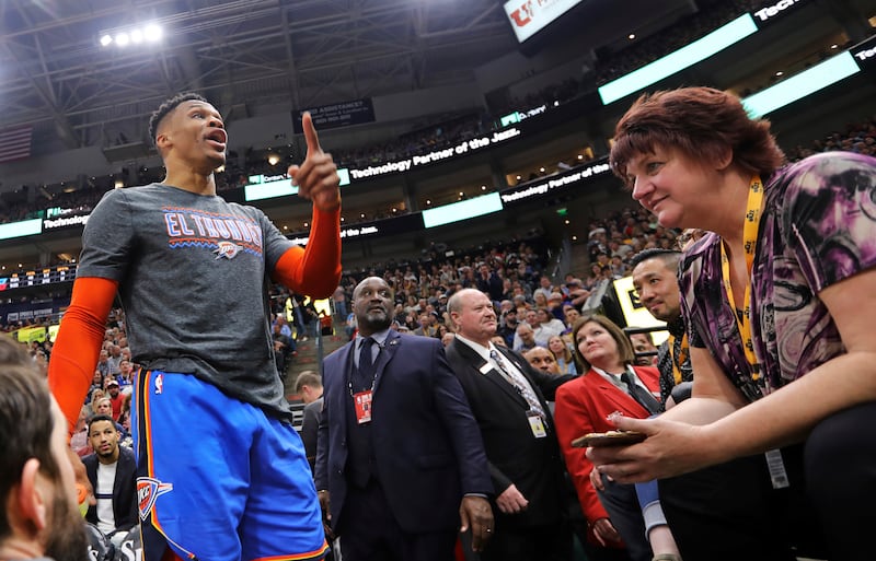 Oklahoma City Thunder's Russell Westbrook gets into a heated verbal altercation with fans in the first half of an NBA basketball game against the Utah Jazz, Monday, March 11, 2019, in Salt Lake City.