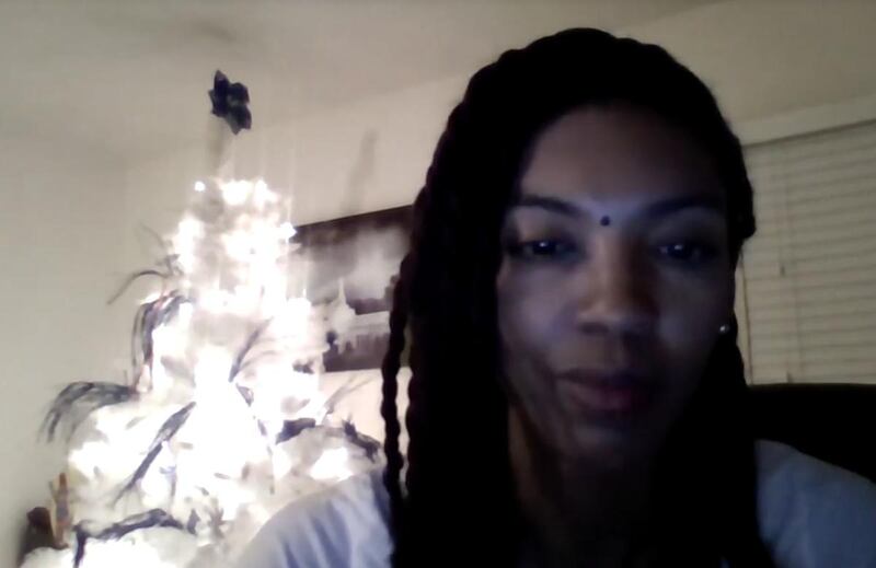 Cristi Ford Brazao is shown in the Facebook video she posted on Christmas Eve explaining her decision to sing at the upcoming inauguration.