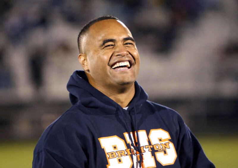 Reno Mahe, who played for Brighton, BYU and the Philadelphia Eagles, has his number retired as Pleasant Grove High School plays football at Brighton High School Friday, Oct. 9, 2009,in Salt Lake City, Utah. Tom Smart, Deseret News